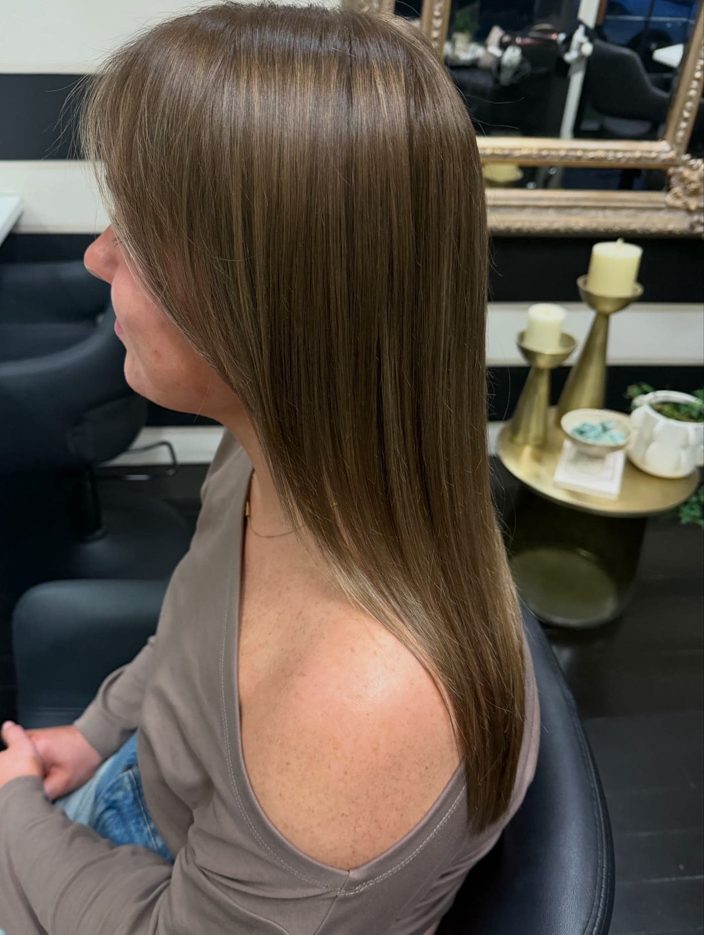 Bright blonde to glossy brunette — hair by Frizz